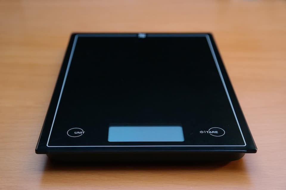 Weighing a drug dose using an electronic scale Stock Photo by ©tesunotai  442606350